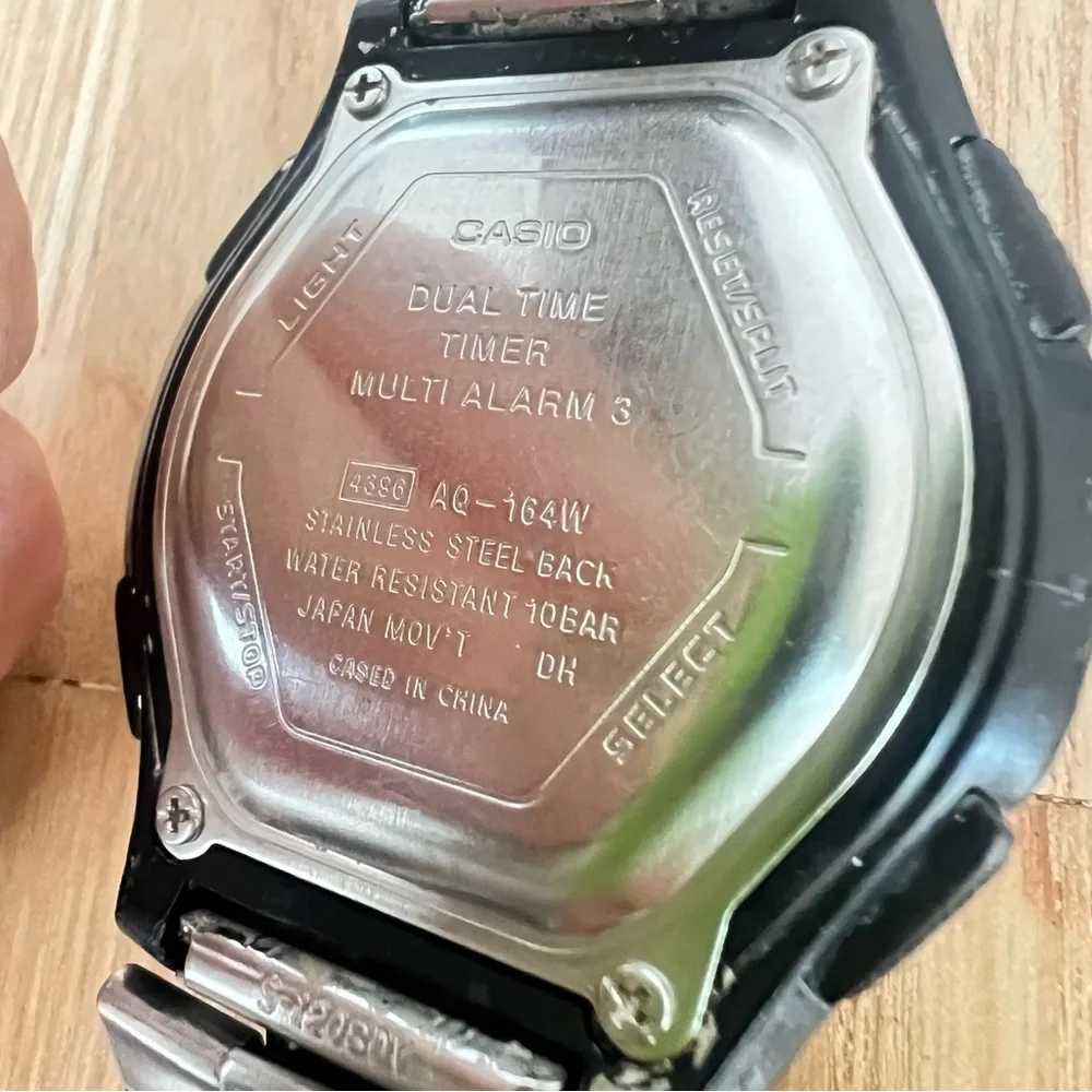 Casio Men's Silver Watch with Black Dial